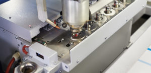 Automatic nozzle changer for Cy-laser systems